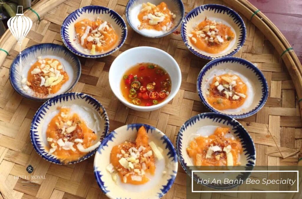 Banh beo is made from rice flour, steamed soft, and topped with shrimp, pork, and shallots.