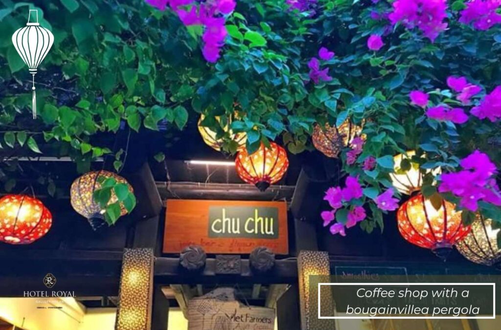 Image of bougainvillea pergola at ChuChu Cafe in the evening.
