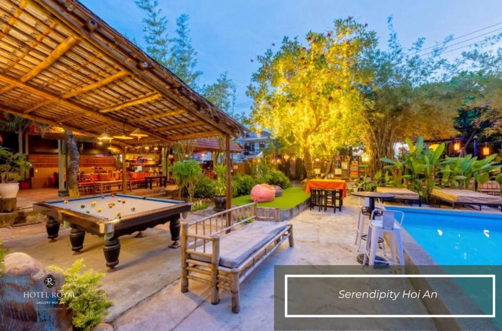 The space at Serendipity Hoi An features a swimming pool and lush garden.